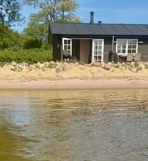 Private sandy beach and sauna