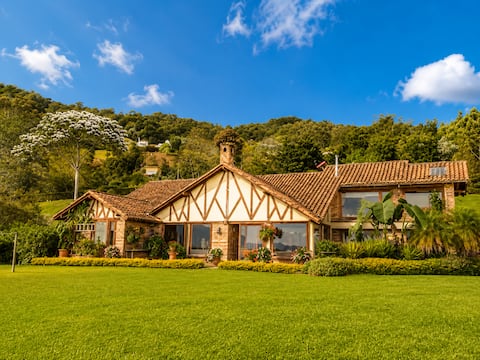 Family farm in La Ceja with a beautiful view and fireplace