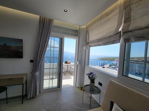 Popular Airbnb listing: Golden Rays Suites | triple room with SeaView in Sarandë