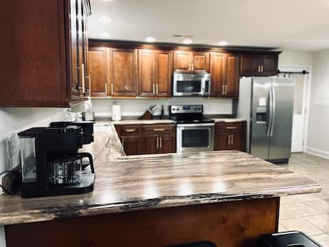 Modern Home with yard & Tesla Charger, Next to UC!