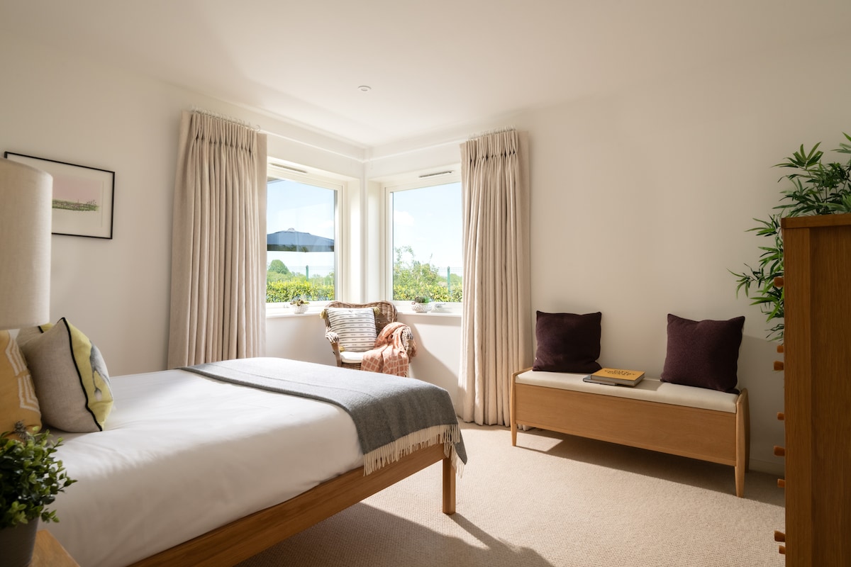 Calm, simple, and softly styled - a room that does exactly what it needs to.