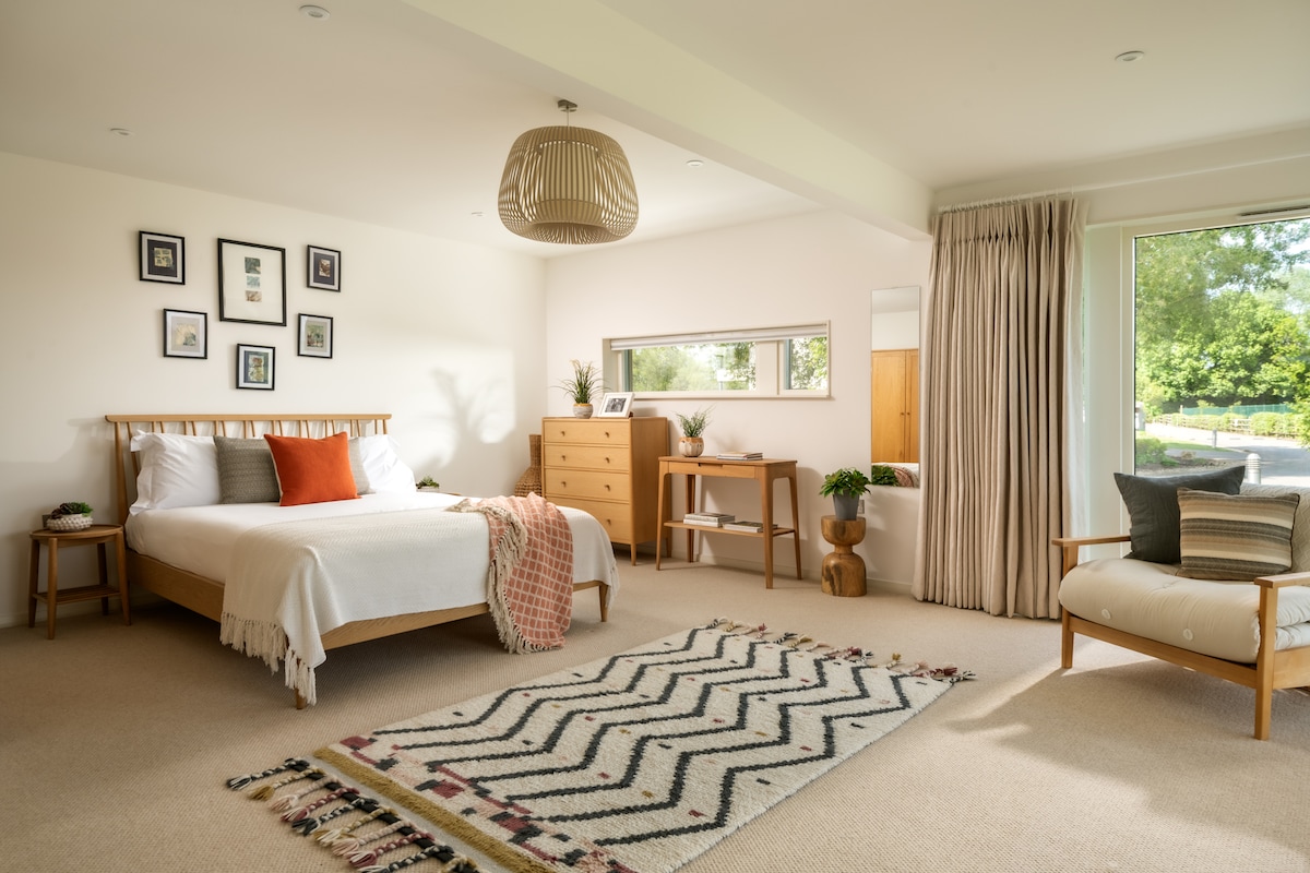 A spacious ground-floor retreat with clean lines, warm tones, and room to breathe.