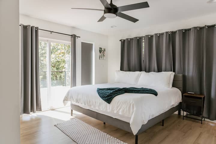 King bedroom with premium mattress and luxury linens.