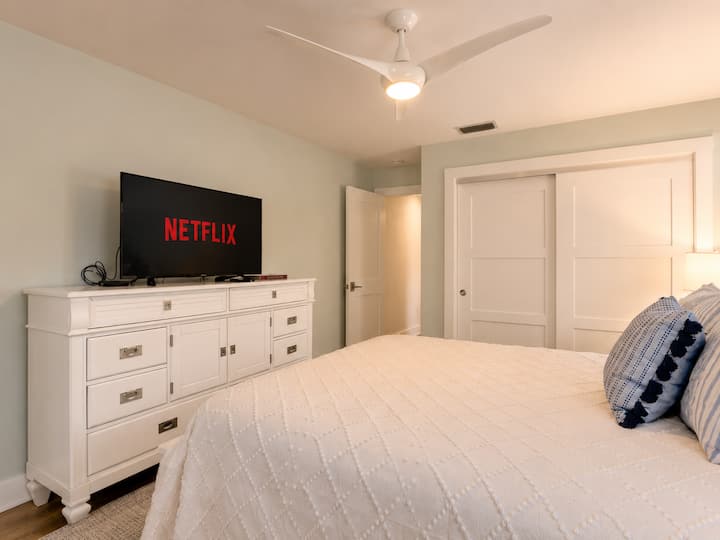 Bedroom 3: Queen bed with closet and TV