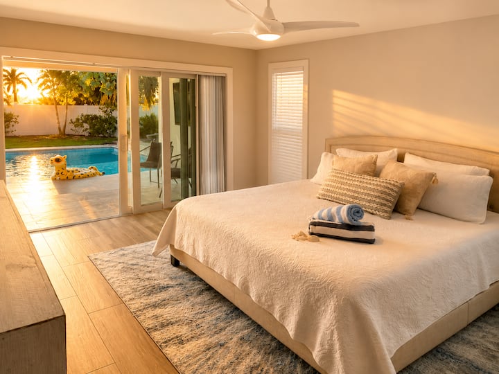 Spacious Main Bedroom Suit , situated in its own wing with direct pool access