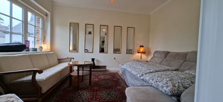 Dormitorio y sala de estar