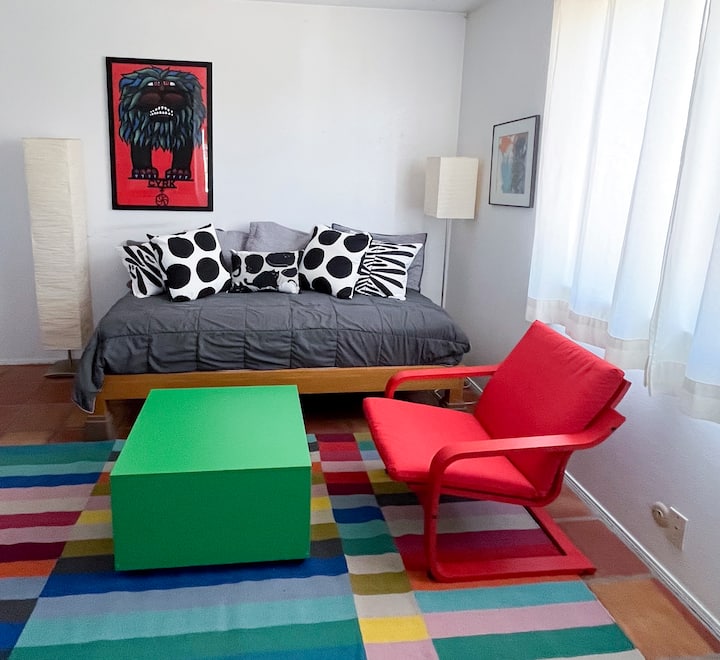 Dormitorio y sala de estar