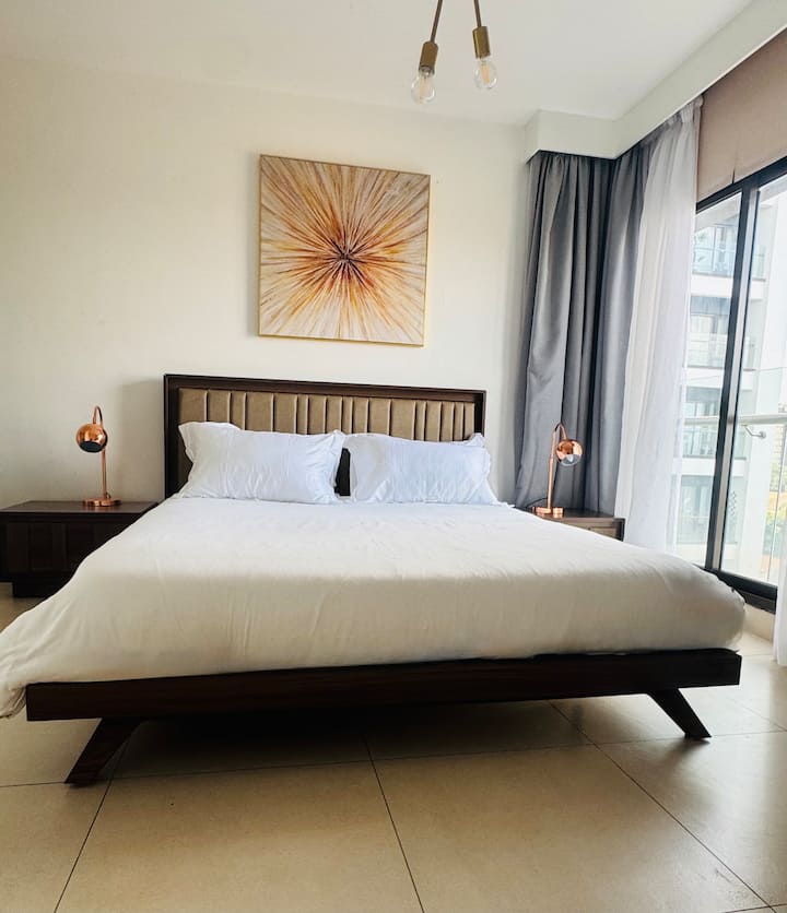 Dormitorio principal con cama tamaño Queen y baño privado 