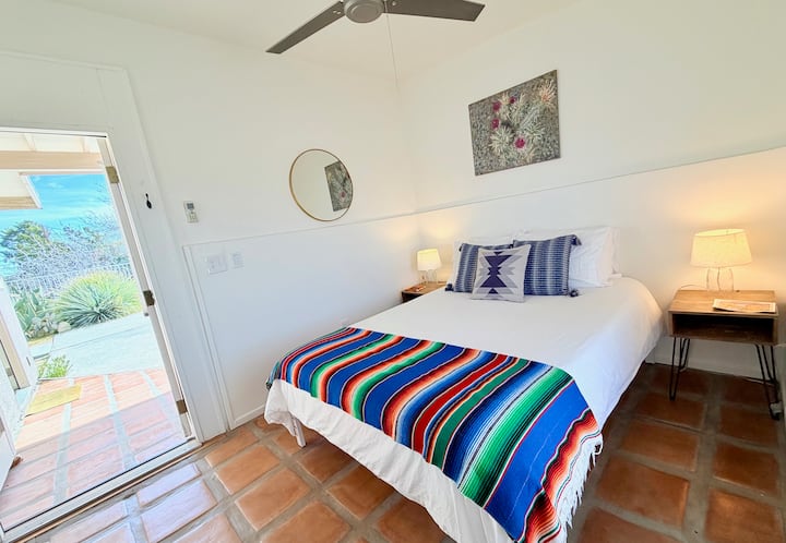 Pomegranate bedroom located in pool house. Queen size bed.