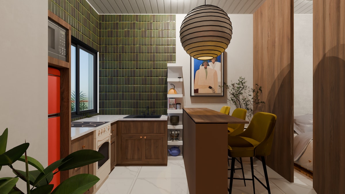 The kitchen showcases modern appliances alongside wooden cabinetry, complemented by vibrant green tiles. A circular pendant light hangs above a bar with two yellow stools, and a window permits natural light. Artwork and plants add character to the inviting space.