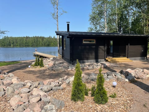 Sunny cottage along kymijoki