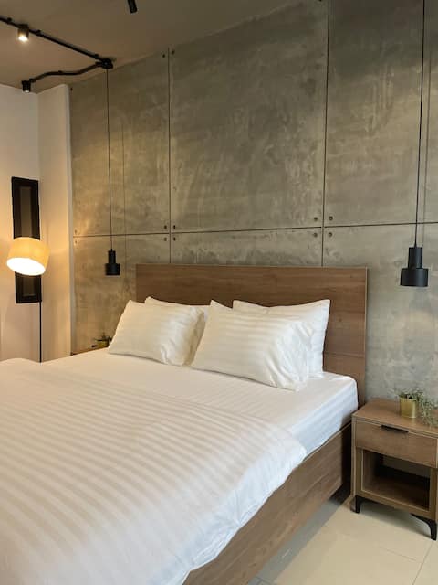 The Concrete Loft | DHA Phase 6 | King Bed