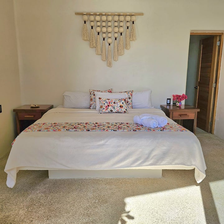 Suite con terraza con jardín