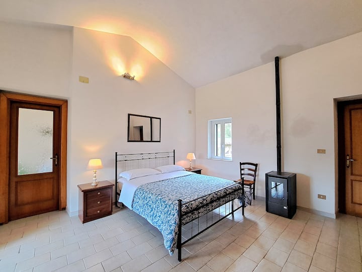The peculiarity is that the room is connected to another bedroom with single beds that is very appreciated by families and groups of friends.