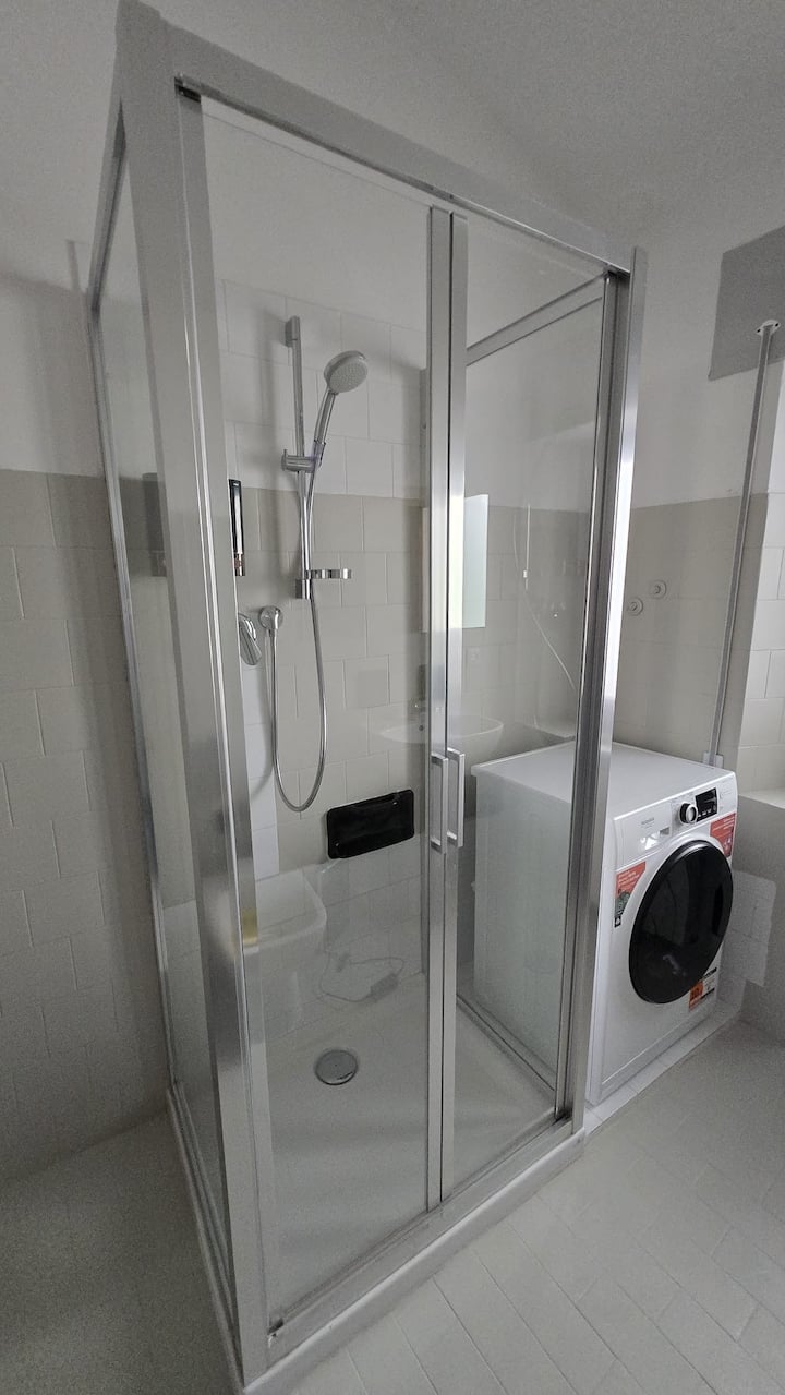 Bagno con lavanderia