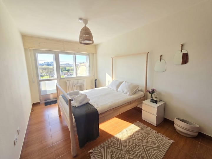 Bright bedroom with a double bed and direct access to a private terrace. Spacious and cozy space, designed for maximum relaxation. We offer a free crib upon request for your total convenience. A perfect retreat to relax!