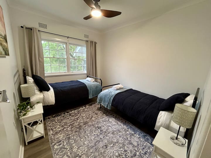 Two single beds, linen and towels provided, ceiling fan