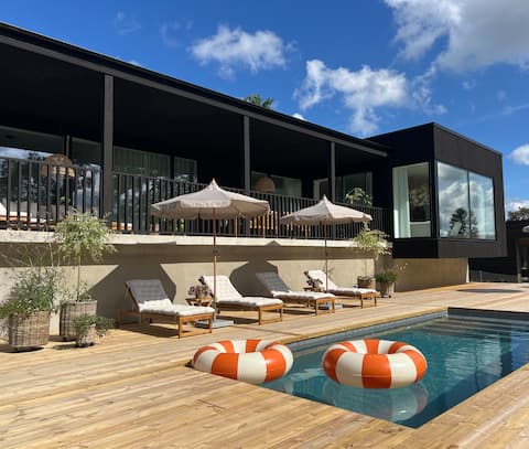 Lake house with large terrace, heated pool & sauna