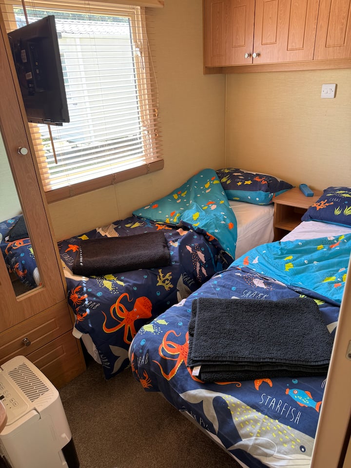 Peut être configurée comme chambre double ou à deux lits