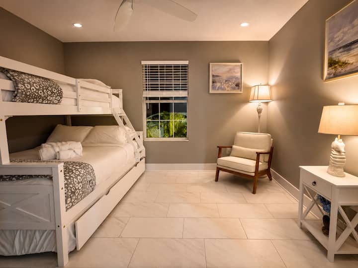 A guest-favorite setup! This room includes a bunk bed plus a pull-out trundle, making it perfect for kids, cousins, or group stays—comfortable, space-saving, and sleepover-ready.