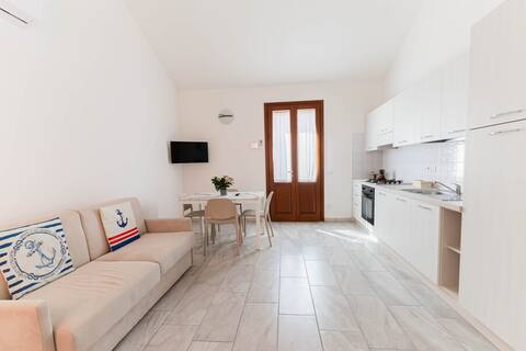 (B) Cozy house in Sardinia