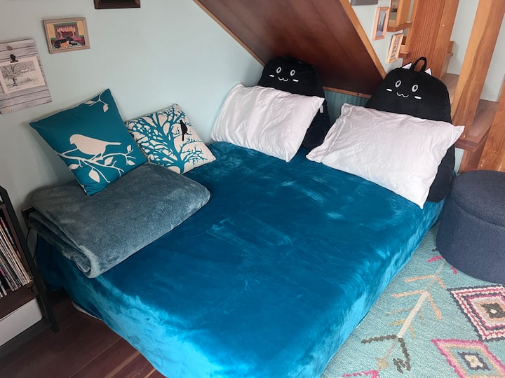 Here is the couch made up for sleeping. It is a full sized bed.