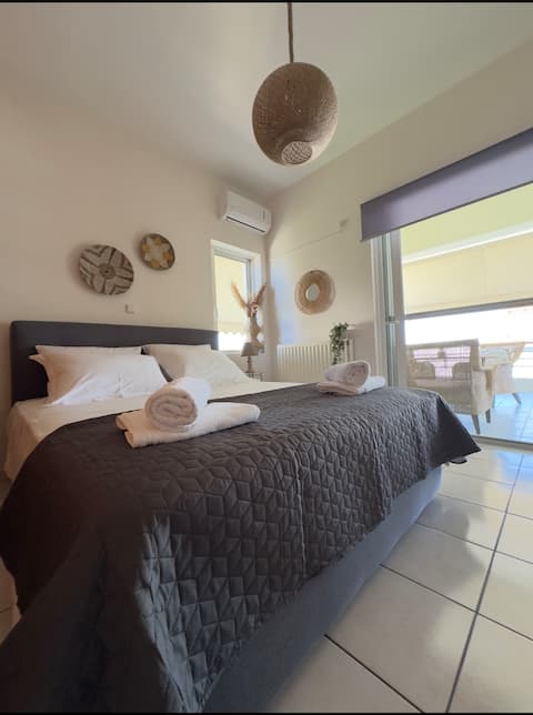 Anemoessa | Seaside Retreat with Balcony & View