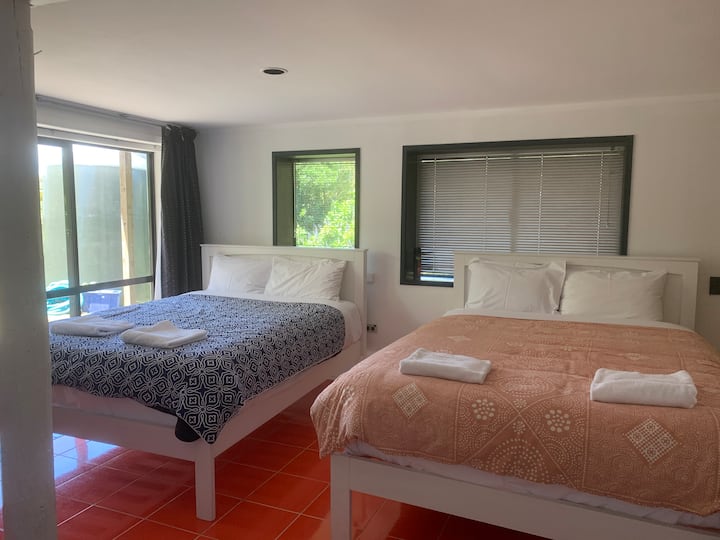 Room downstairs with separate bathroom and shower.  Access outside by driveway to downstairs entrance.