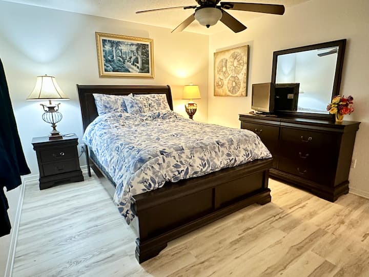 This cozy room has a queen size bed and smart TV