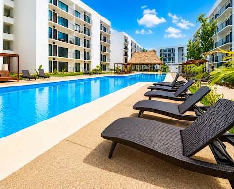 First-floor apartment, steps from the pool