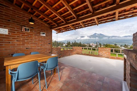 Private home with garden and panoramic rooftop.