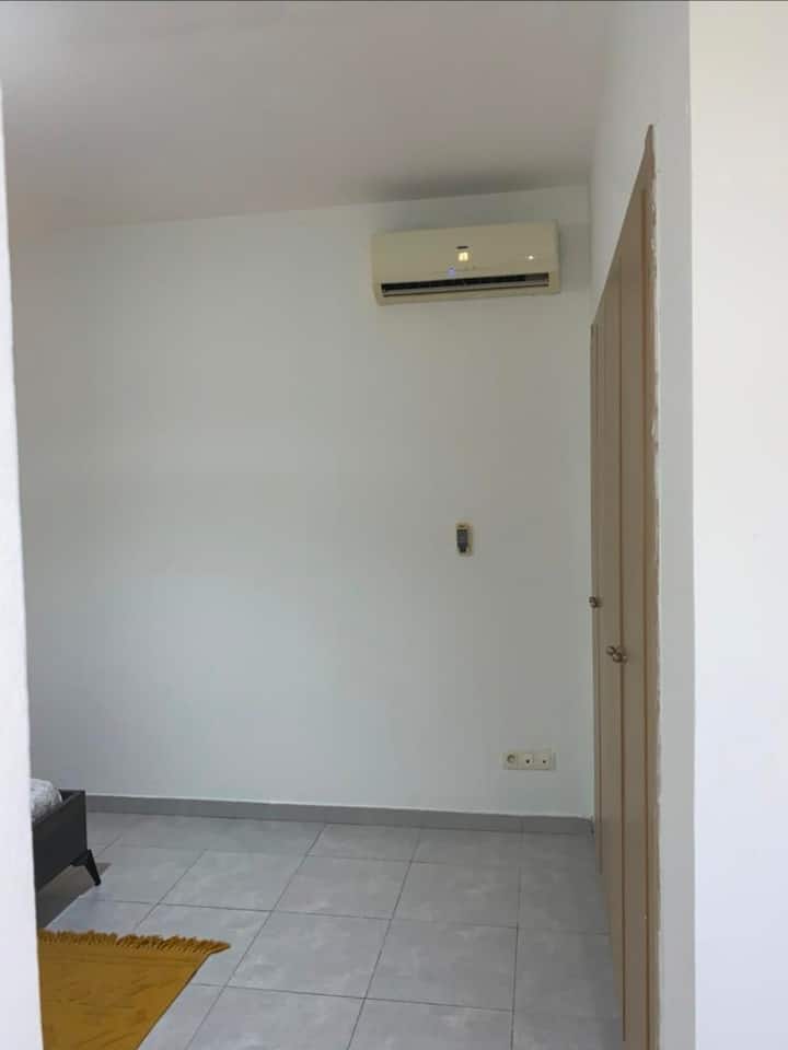 Chambre principale de l'appartement Akanda