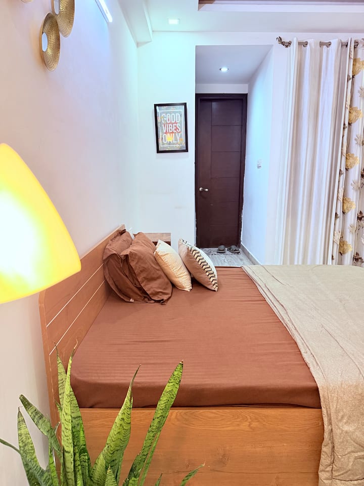 Standard bed with private washroom & cupboard