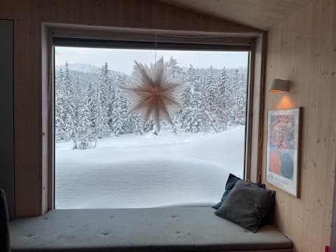 Top Airbnb: Cabin in funky style - beds made in Vinje