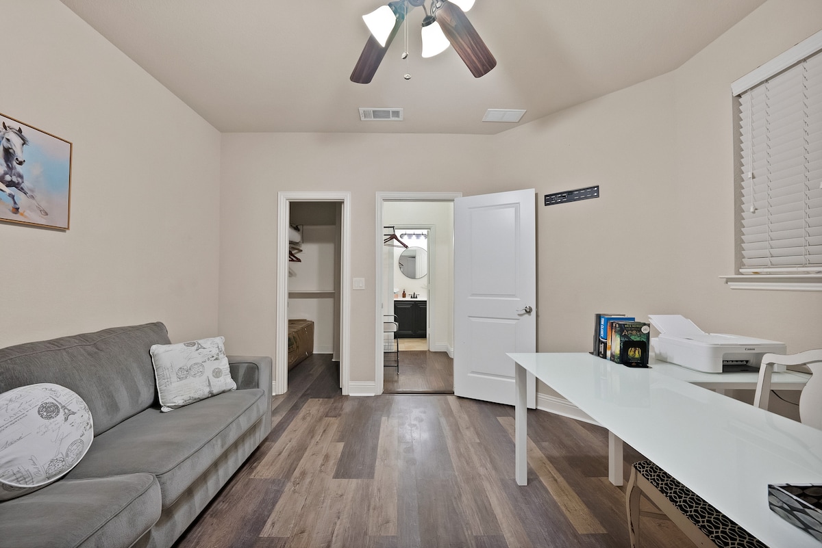 Productive by day, hospitable by night: A dedicated office space with high-speed internet and a sofa bed for overnight guests.