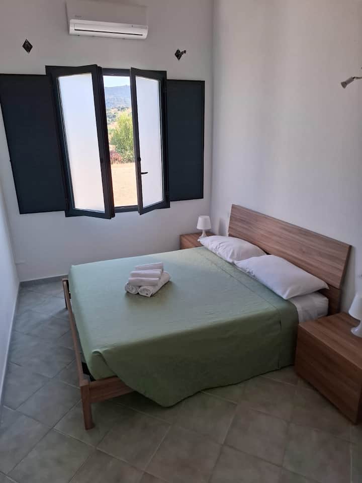Stanza Doppia Con Bagno Privato 
Su Debieddu Rooms - Budoni