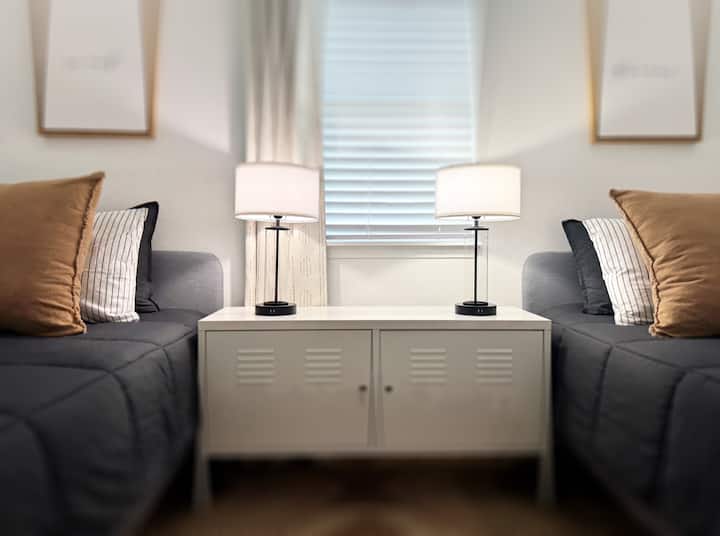 Bedding and décor for these twin beds may vary slightly from stay to stay, always thoughtfully styled for comfort. This is one example.