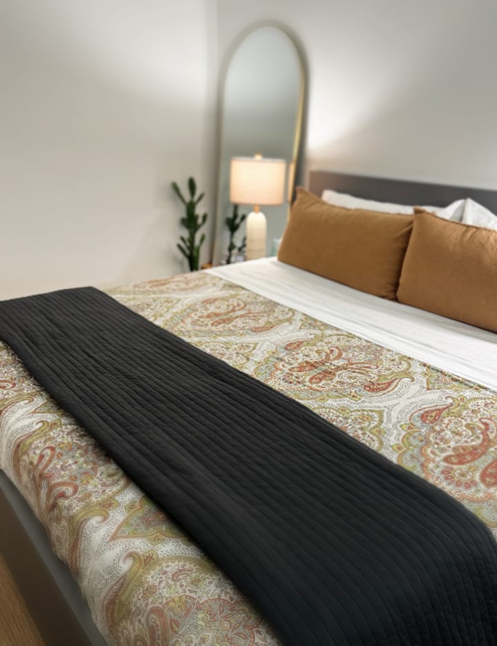Bedding and décor may vary slightly from stay to stay, always thoughtfully styled for comfort - example