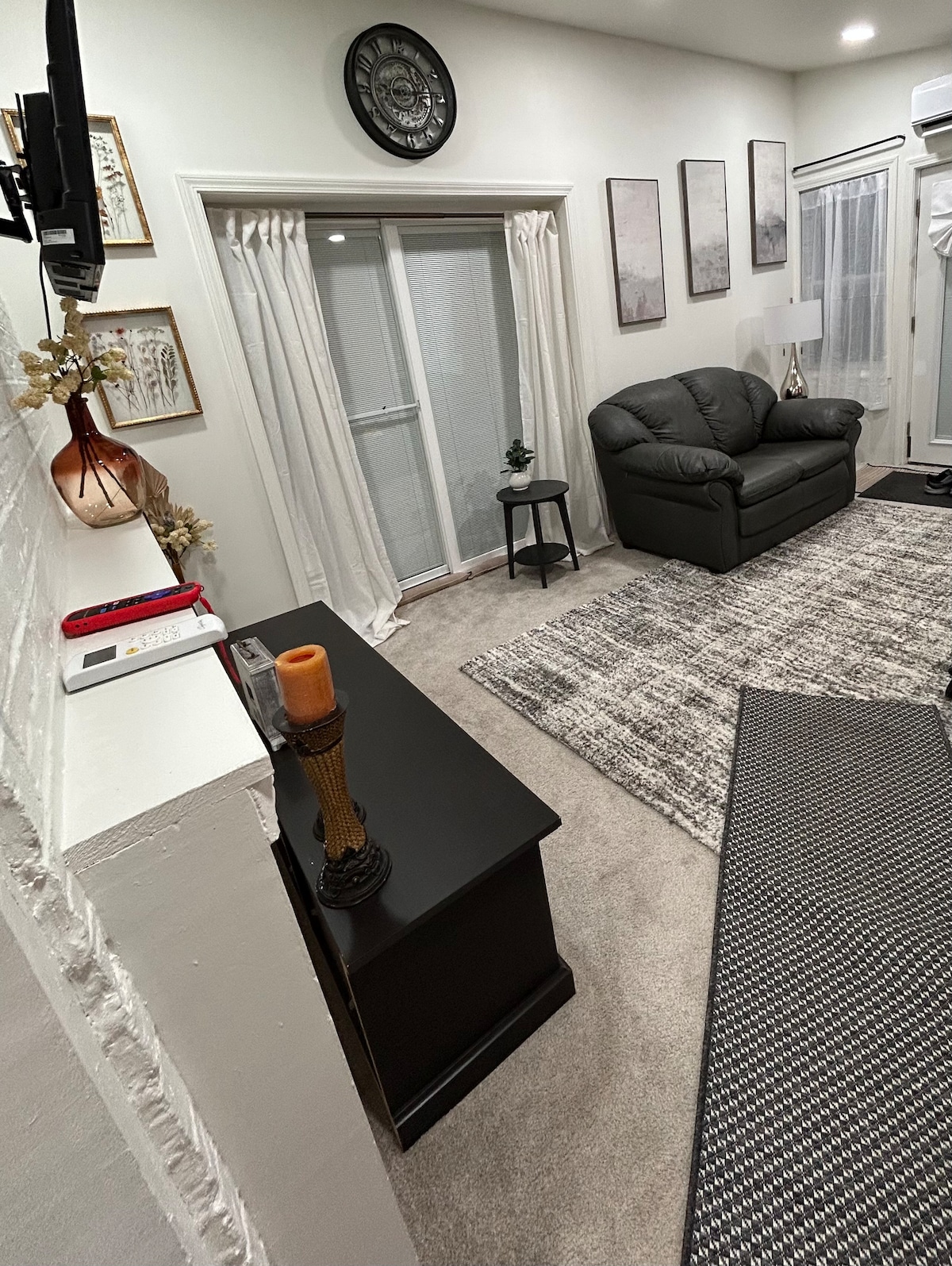 Living room — sofa, coffee table, slider door