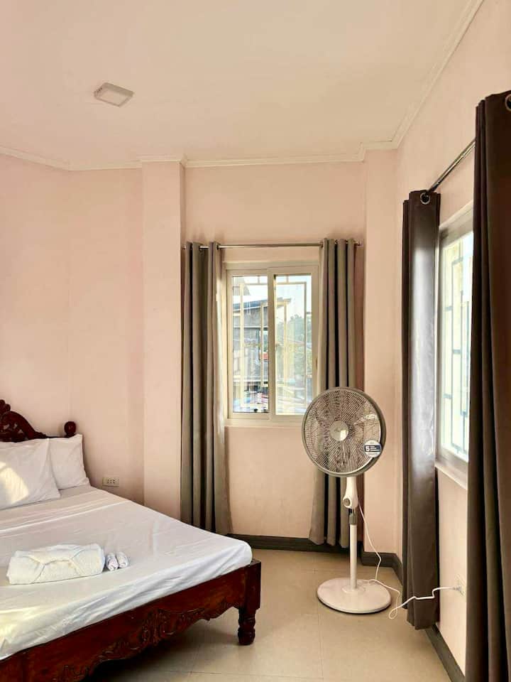 This bedroom  is located upstairs nearest to the stairs