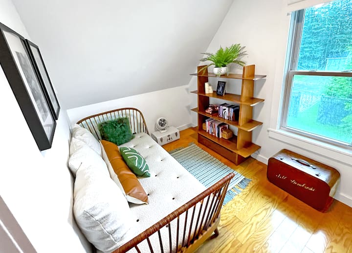 The 3rd bedroom features a handsome Frode Holm daybed and Edward Wormley bookshelf.