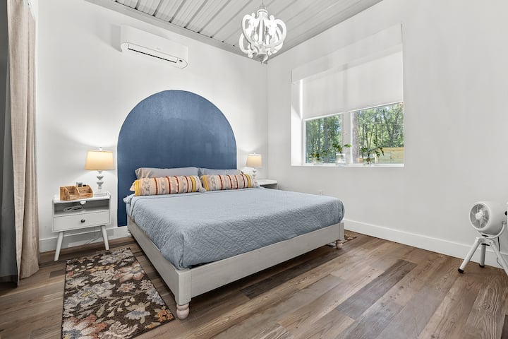 Bedroom 2 has a king-sized bed and a full bath that is shared with the hallway through a separate door. Each bedroom has its own climate control via a mini split for your comfort.