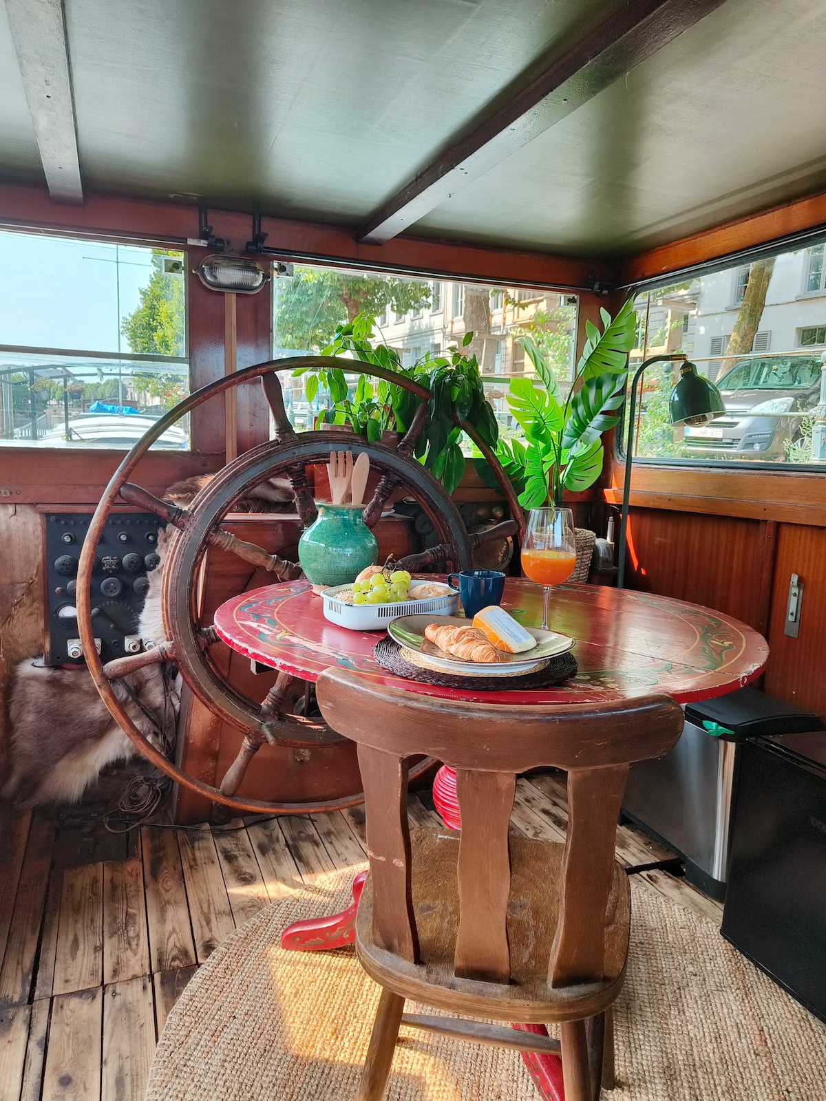 Dining area image 4 at Lou Andrea Salome — historic cargo-ship wheelhouse in Ghent