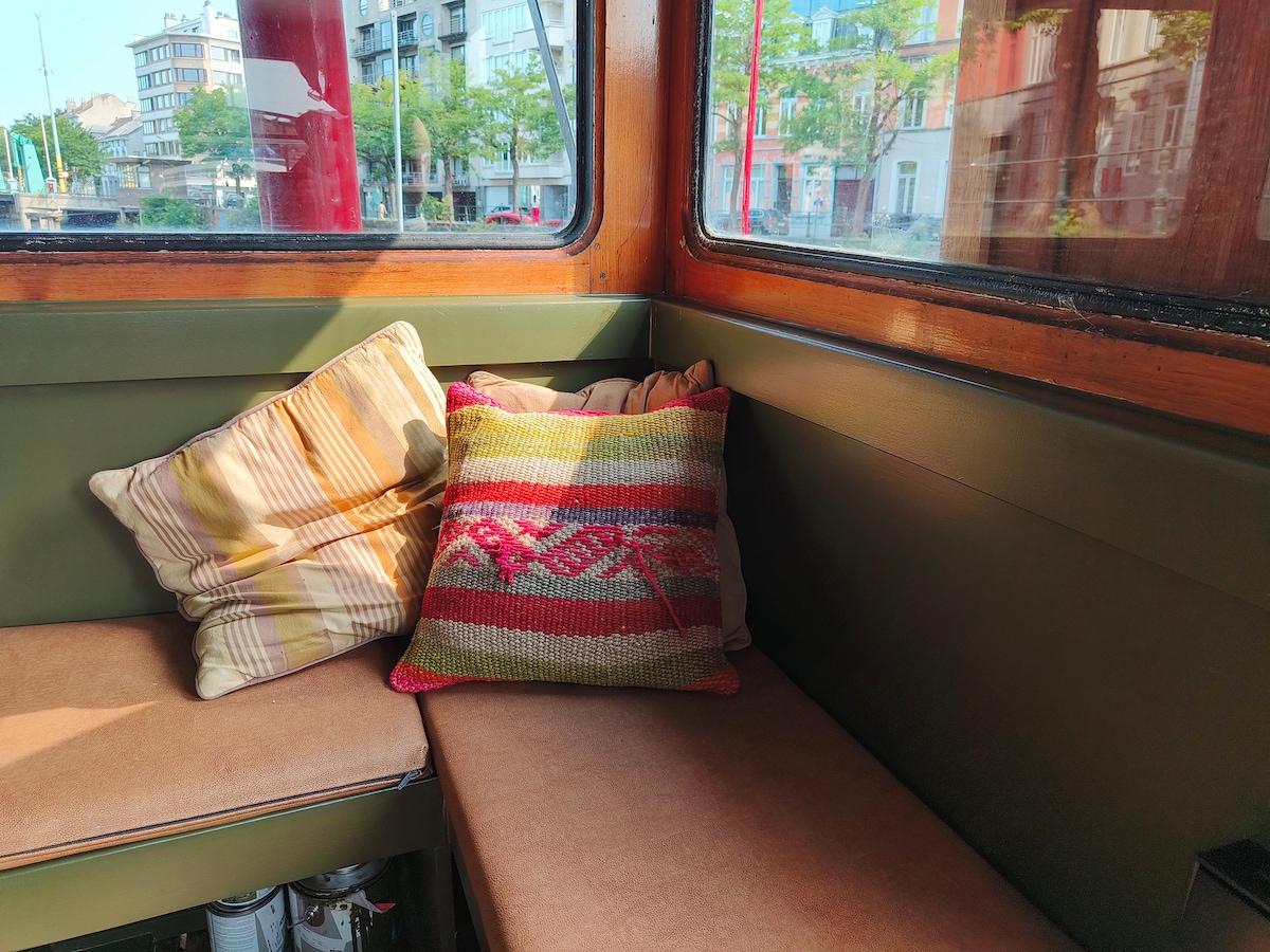 Living room image 3 at Lou Andrea Salome — historic cargo-ship wheelhouse in Ghent