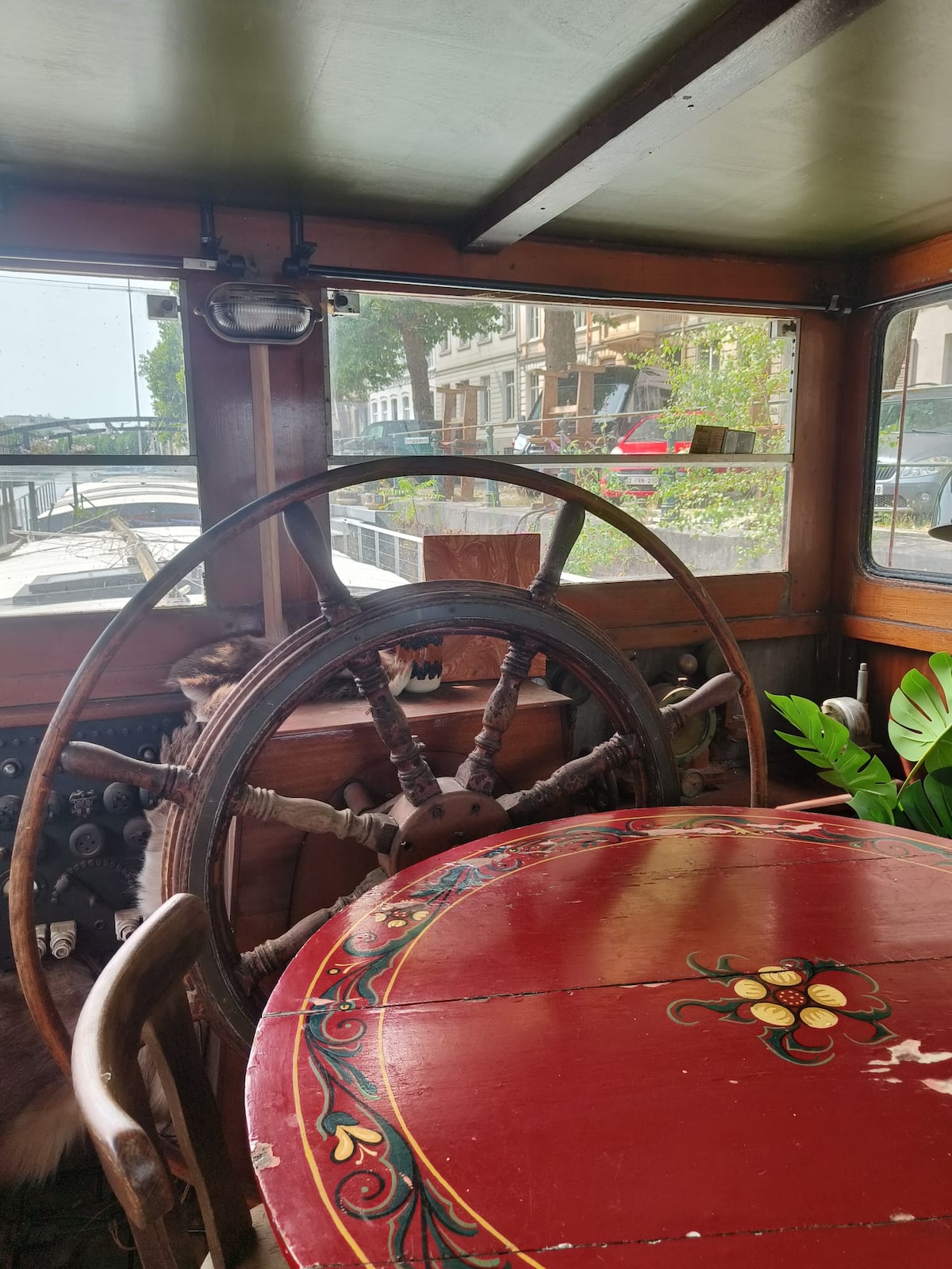 Dining area image 3 at Lou Andrea Salome — historic cargo-ship wheelhouse in Ghent