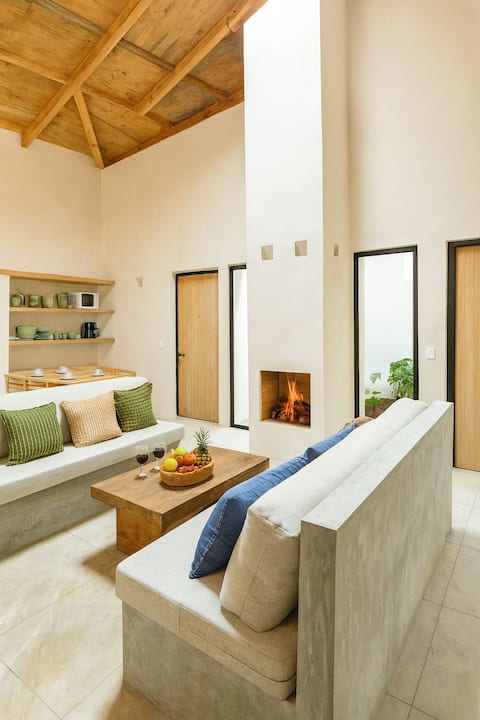 Jungle House · House with living room and fireplace