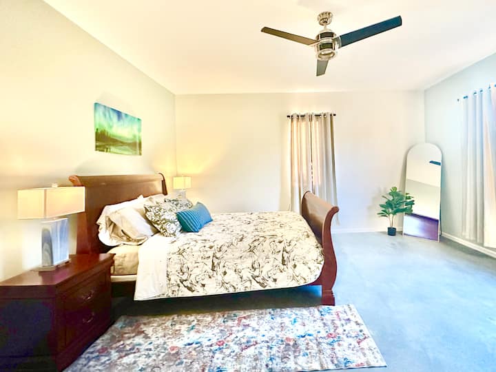 Master bedroom upstairs with its regular (non-holiday) bedding. This room has a walk in closet (not in picture).
