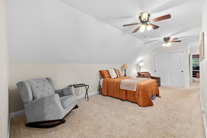 The Fifth Bedroom:: This is a loft and Features a Full Size Bed + Single Chair that folds out to a bed