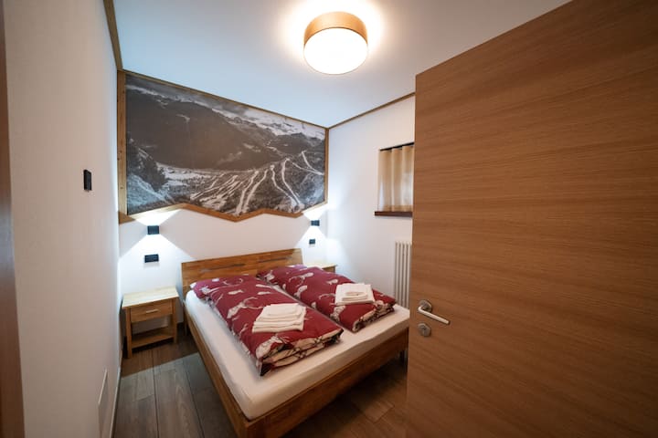 Pogled na spavaću sobu u smještaju Cancano