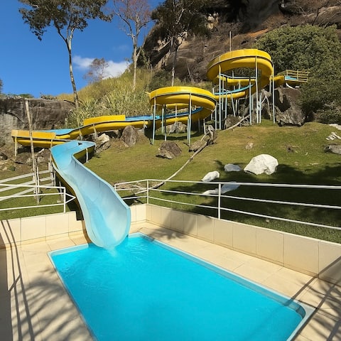 Ranch in the mountains (field, waterslide, wood-burning stove)